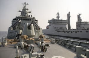 HMAS Arunta conducts a Replenishment at Sea approach with Indian Navy ship INS Shakti during AUSINDEX 2015. Credit: Defence