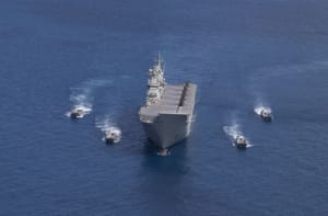 The LHD will be exercising with elements of the Amphibious Ready Element over coming months. Credit: Defence