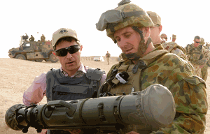 Minister for Defence Materiel, Jason Clare inspecting a Carl Gustav 84mm gun during a trip to Afghanistan earlier this year.