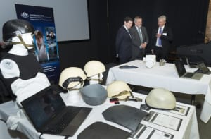 The Minister for Defence Kevin Andrews, and Dr Alex Zelinsky, Chief Defence Scientist, listen as Peter Rowland (Micro-X) explains some of the new technology on display prior to the Minister announcing the successful organisations from Round 19 of Defence's Capability and Technology Demonstrator Program in 2015. Credit: Defence