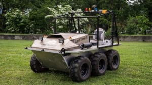 The modified aircraft will carry the Land Tamer 6-wheeled vehicle beneath it in a sling, using Sikorsky's autonomous mission manager system to navigate, avoid obstacles, select a good drop-off site, and to take off and land.