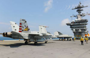 At the completion of the manned/unmanned flight trials, the X-47B landed safely aboard CVN 71, catching and quickly releasing the arresting cable before folding its wings and taxiing clear of the landing area.