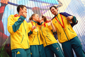 Australia's gold medal winning 470 sailors celebrate in Qingdao.