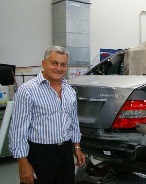 Lee Koudsy in his present shop LSR Autobody.