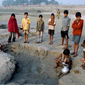 Open Category winning image &ldquo;Collecting Water&rdquo; by Avijit Bhakta (India).