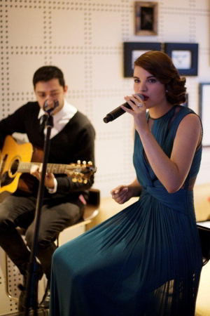 FESTIVE SPIRIT: Emma Birdsall serenades guests.