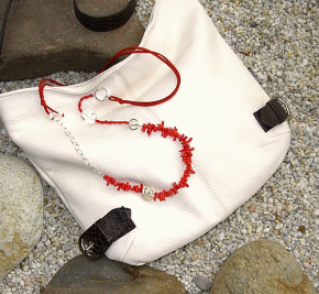 COQUETTE RED: Rolling out changes for spring/summer 2010/11.