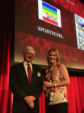 Sportsgirl CEO Elle Roseby pictured receiving the award for best over-20 chain from Andrew Lysaght, director of specialised services for awards naming rights sponsor TNT.