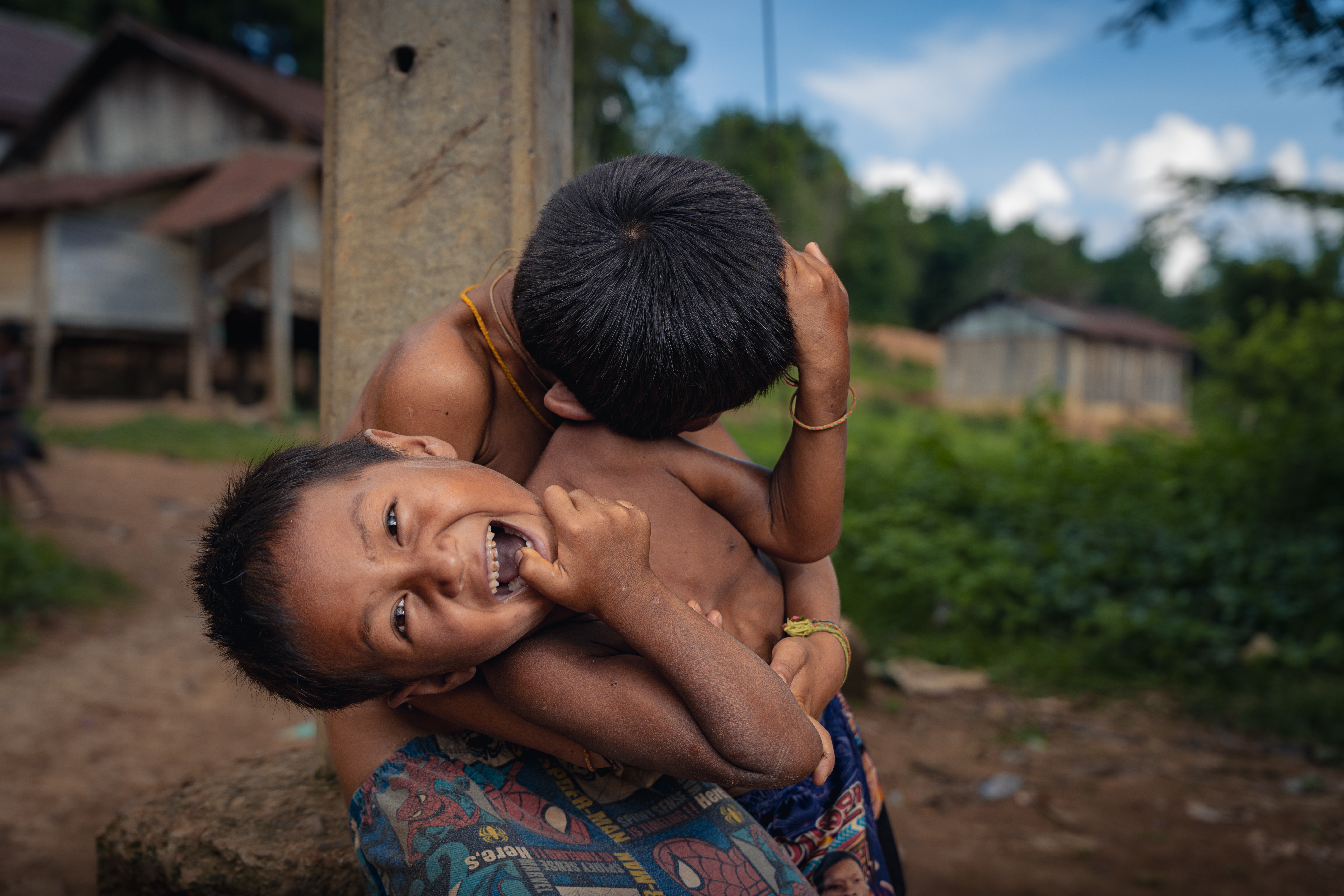 Boys in a remote village in Northern Laos. Their laughter and unbridled joy was infectious and, in joining in with their mischief, I was able to build trust in the local community. From there, I was granted permission to photograph much of the village. Sony A7C II, Sigma 24-70mm f/2.8 G2 lens @ 44mm. 1/500s at f4, ISO 100.