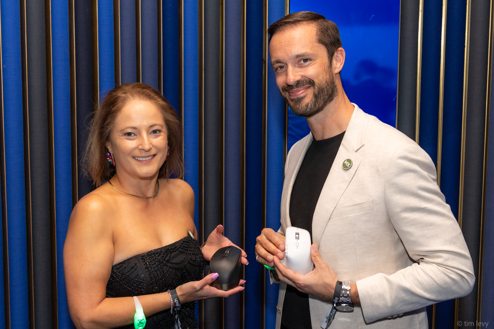 Marisol Vargas (Senior Category Manager at Logitech Oceania) holds the original MX Master from 2015, while Damian Lepore (MD of Logitech Oceania) holds the latest MX Master 4Logitech 10th anniversary of MX Mastery. Image: Tim Levy