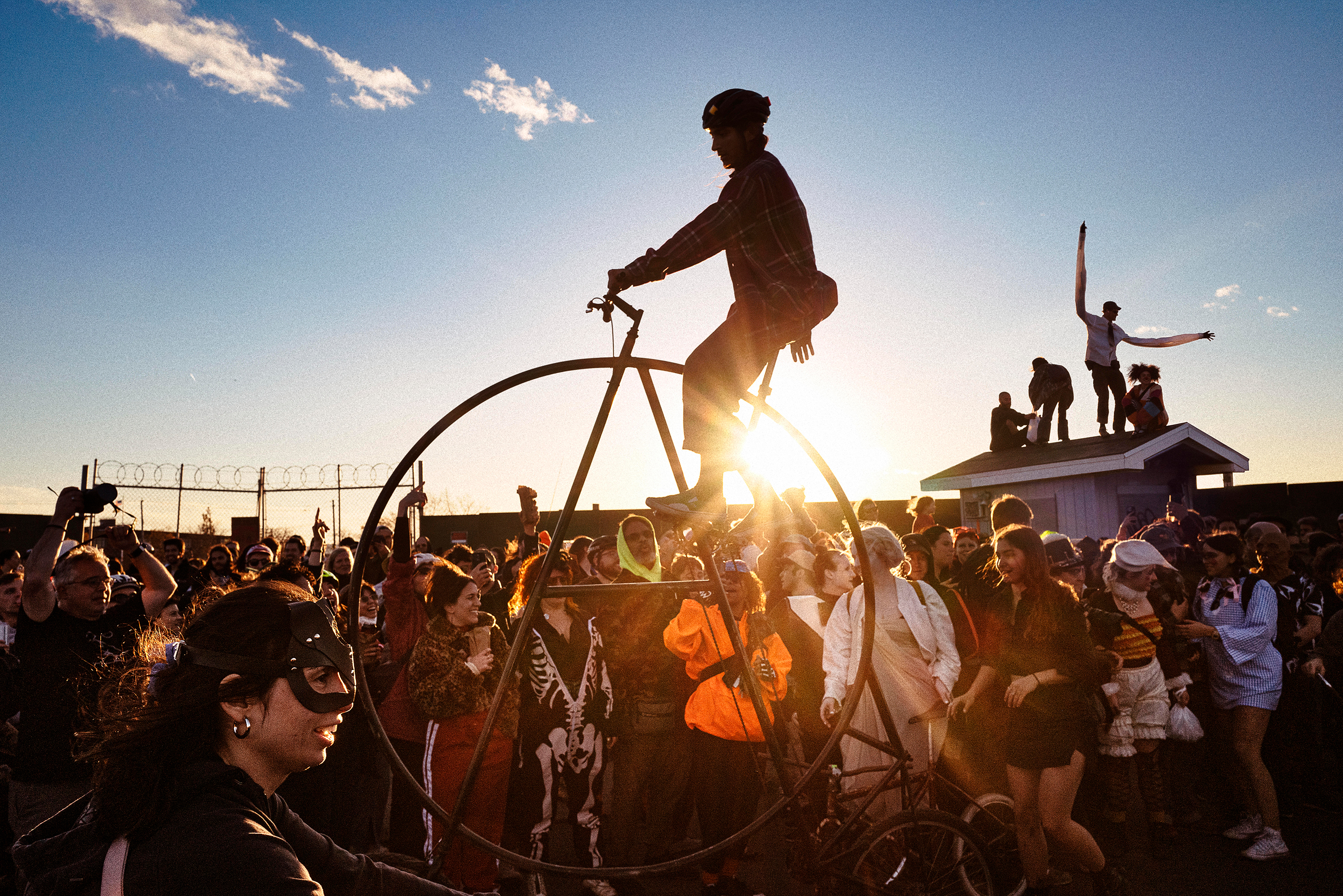 Brooklyn’s Bike Kill.On a late-afternoon in Brooklyn’s industrial backstreets, Bike Kill unfolds — riders wobbling atop Frankenstein bicycles while a raucous, costumed crowd cheers. It’s part anarchy, part carnival, all celebration. Riders and bikes veer into spectators, but remarkably, no one seems to mind — or be hurt.