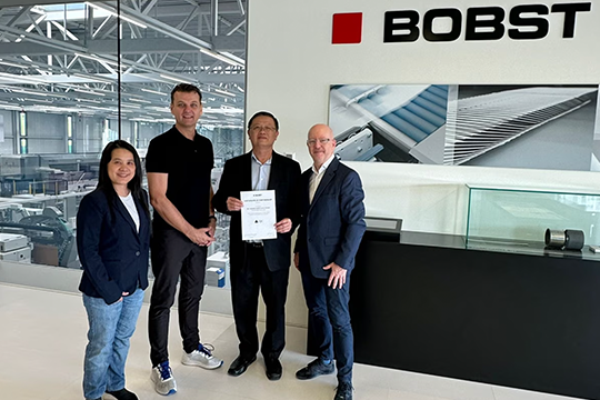 Bobst in Thailand: (l-r) Jiraporn Tongtem, product manager at BJC; Peter Woods, zone business director for PL Label at Bobst; Paiboon Chutimapongrut, vice-president of BJC; and Nigel Tracey, head of sales, business unit printing and converting at Bobst