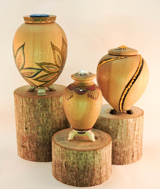 Catherine Gorrie, &ldquo;My button Collection&rdquo;, is a group of three lidded boxes with feet, each inspired by a beautiful button embedded in the lid. Artwork enhances each one. 200 x 200 x 200mm