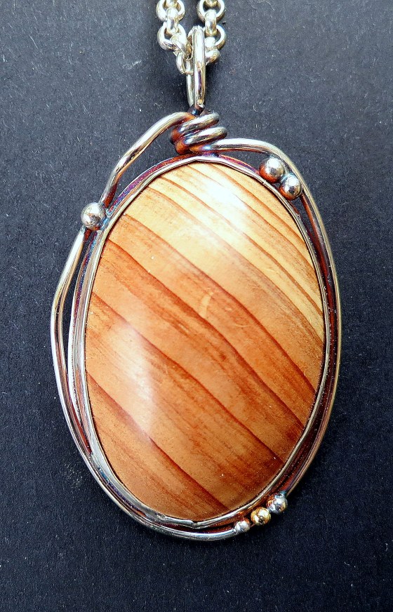 Minky Grant, Pendant made from Japanese Cedar from Sydney Royal Botanic Gardens Treecycle 2016 exhibition. Set in Sterling silver on sterling silver chain signed.