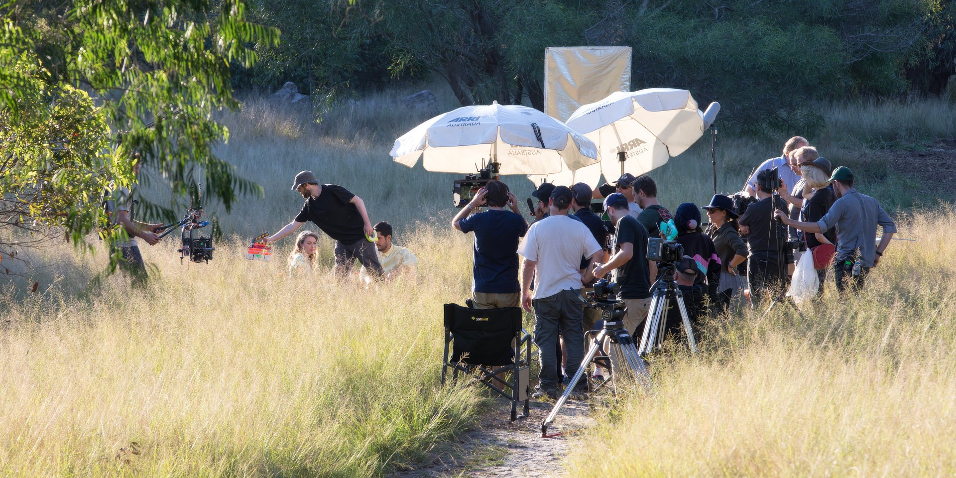 On screen, the viewer sees only a quiet, intimate picnic, but hovering just out of frame is a crew of more than twenty on the set. On a limited budget, you can effectively combine crew roles. This means foregoing specialists for wardrobe, makeup, art, and script, while even handling lighting and sound yourself. Photo: Tim Levy