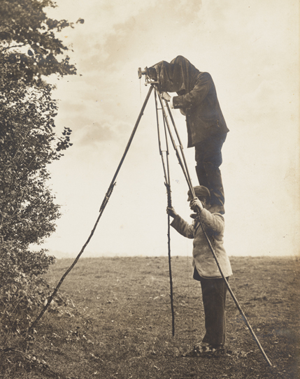 The Keartons photographing a bird's nest, 1890s. Cherry is on Richard's shoulders. Richard and Cherry Kearton introduced the 'hide' method of bird-watching and photography. Photo: National Media Museum