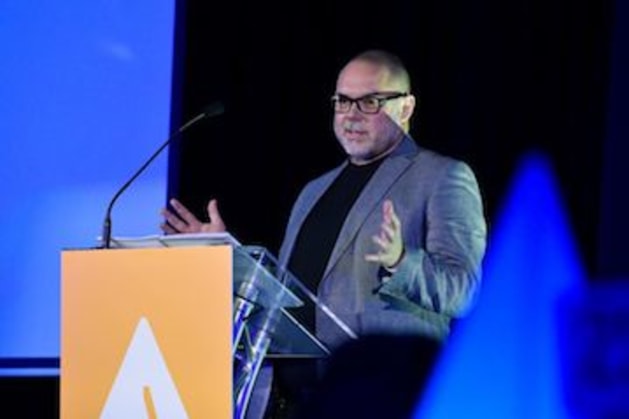 'The Awards are crucial for the industry': Nic Eldridge, AGDA CEO at the podium in Canberra.