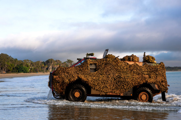 A Protected Mobility Vehicle Bushmaster disembarks a landing craft during Exercise Talisman Sabre 2025.

Credit: LSIS Susan Mossop / Defence