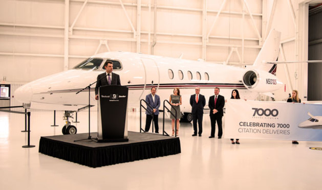 NetJets CEO Adam Johnson addresses the crowd at the presentation ceremony for the 7000th Cessna Citation. (Textron Aviation)