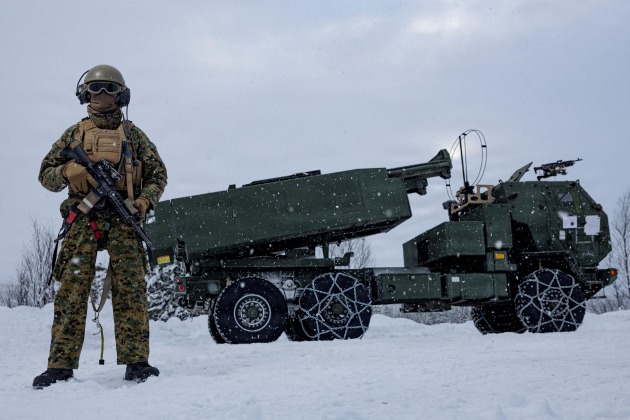 U.S. Marine Corps Cpl., an assistant section chief with 2nd Battalion, 10th Marine Regiment, 2nd Marine Division, poses next to a M142 High Mobility Artillery Rocket System during Exercise Cold Response 26 at Setermoen, Norway, 24 February, 2026.

Credit: US Marine Corps 2nd Marine Division