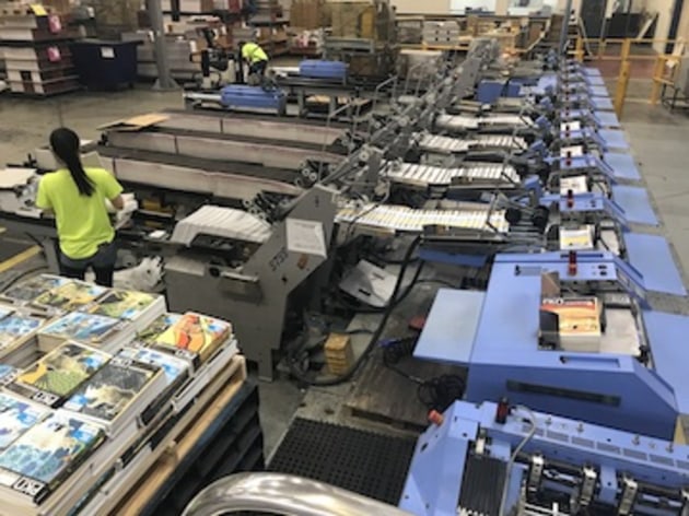 Binding the magazine at Bluestar in Sydney.
