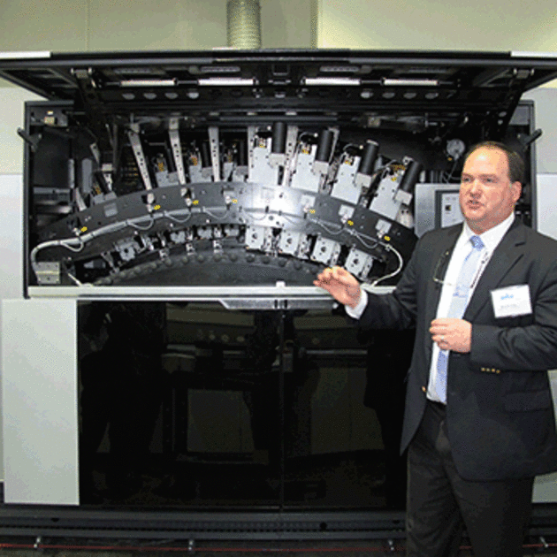 Michael Ring, formerly of Xeikon now with Gallus, shows off the Heidelberg Labelfire in St Gallen last week. (photo : Naresh Khanna.)