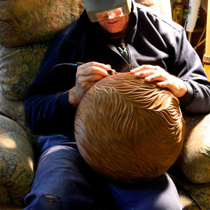 Neil Turner at work on his Jarrah Sphere.