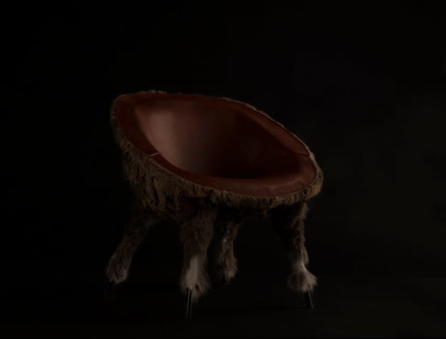 TRENT JANSEN | NSW

In Western Arrernte mythology, pankalangu is a territorial being living in the scrub, camouflaged in the desert and bush. He moves with the rain, made visible when droplets fall over his body &ndash; caught by the light they define his form in a glistening silhouette.

The Pankalangu Arm Chair layers an intricate lattice of Tasmanian wallaby pelt over copper &ndash; The pelt covers the copper, exposing copper tips at the end of each scale-shaped incision.