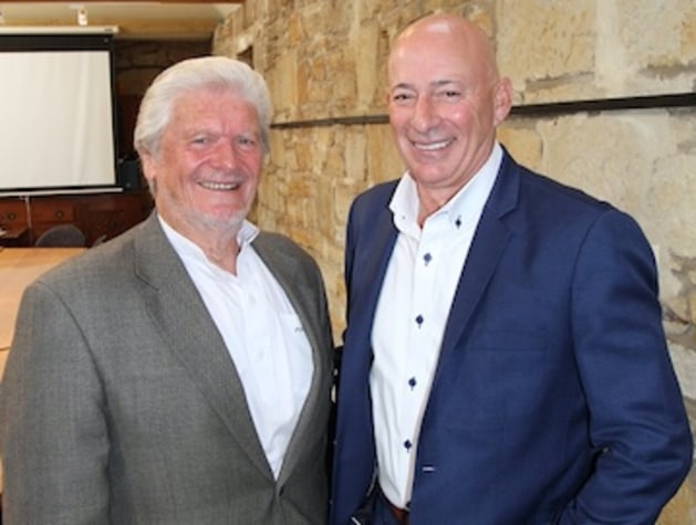 (l-r) Peter Clark (PIAA Board) with Craig Pearce (Flying Colours Printing) at the TPC in Ross.
