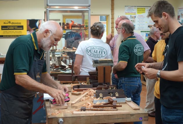 Terry Gordon (left) with a customer at the HNT Gordon table.