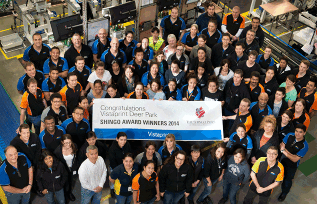 The people who made it happen: workers and management at VistaPrint Deer Park.