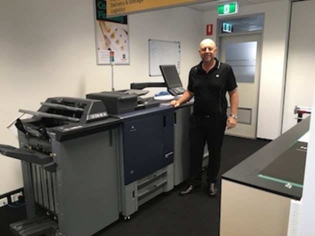 Andrew Ingram, director, MBE Applecross with his new Konica MinoltaALLAccurioPress C2070.