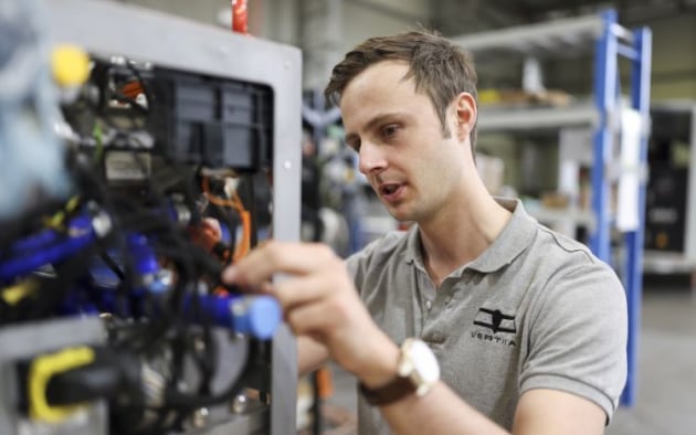 Associate Senior Engineer Alfie Swallow works on AMSL Aero's Hydrogen Fuel Cell. (Peter Morris for AMSL Aero)