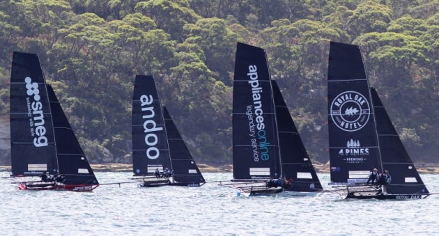 Classic battle to the windward mark. Photo Michael Chittenden/18 Footers League.