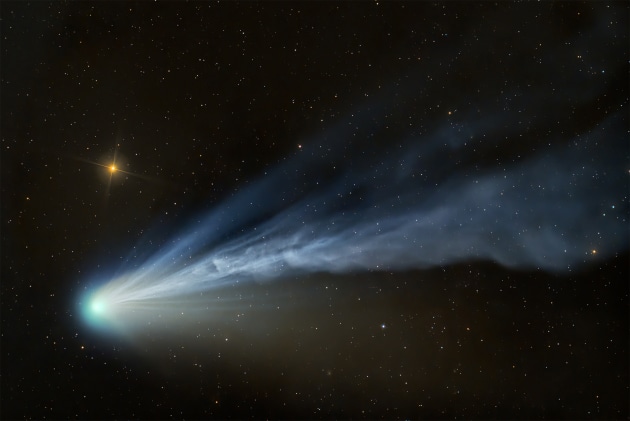 Planets, comets and asteroids, Winner, Comet 12P/Pons−Brooks Taking a Final Bow © Dan Bartlett (USA)
Comet 12P/Pons−Brooks reacted visibly to the intensified solar winds associated with the current solar maximum, creating a spectacle of tail dynamics and colourful hues expelled by its nuclear coma, the bright cloud of gas around the comet’s centre.