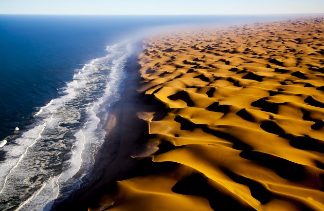 This old image from Namibia is one of my favourites. It was shot through the plexiglass window. The original raw result (above) is flat and hazy but Lightroom features like Contrast and Dehaze can do so much to recover information, even with old files. Canon 5D, EF24-105mm f/4L IS USM lens @ 47mm. 1/750s @ f5.6, ISO 100.