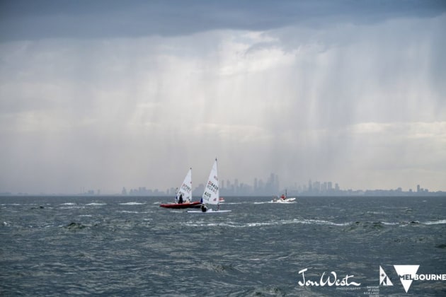 Thunderstorms swept Port Phillip Bay during the third day of the Laser Radial World Championship. Photo Jon West Photography.