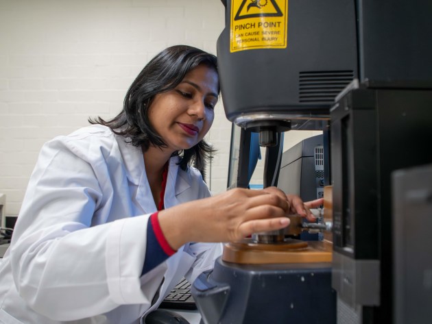 Professor Nidhi Bansal setting up a Rheometer to determine the texture properties of a food product.