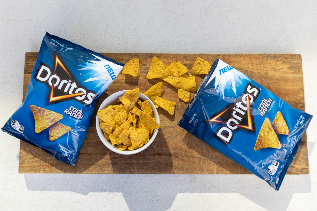 PepsiCo is bringing back a nostalgic flavour to Australian shelves next week, with the re-launch of Cool Ranch Doritos from 30 July.
Source: PepsiCo Australia