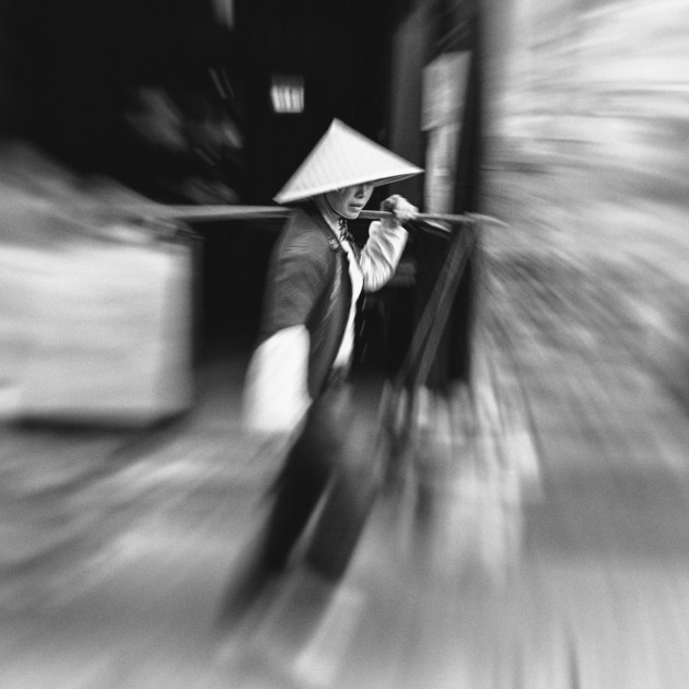 Captured in Dalat, this was a busy scene. It was nice in colour, but a BW conversion in Nik Analog Efex (and a crop) really transformed the image. Fujifilm X-E1, 18-55mm f/2.8-4 lens @ 27mm. 1/120s @ f4.5, ISO 800.