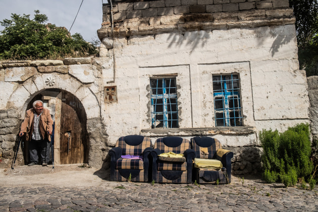 I've walked and shot on the streets of Urgup in Cappadocia, Türkiye, many times over the past decade, often while shooting the Cappadocia Ultra trail. I was scouting this backstreet the day before the race, and was waiting for a couple of runners to pass when the house owner walked out. For me it sums up the real Cappadocia tourists rarely see. Fujifilm X-T2, XF18-55mm lens @ 20mm. 1/1600s @ f5.6, ISO 200.