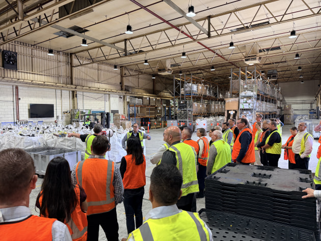 Behind the scenes: Guests toured the plant, observing canisters being shredded and processed into TonerPlas pellets.