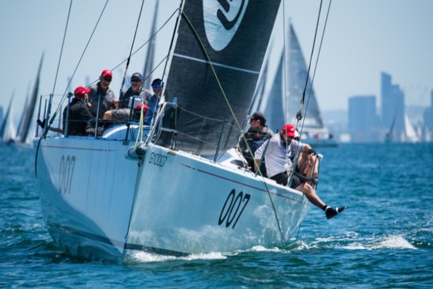 Line honours winner Extasea with the Melbourne skyline in the background during the 2020 ORCV Cock of the Bay Race. Photo Michael Currie.