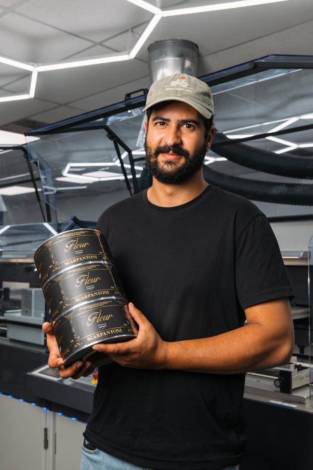 Satisfied client: James Scarpantoni, winery owner, with labels hot off the press