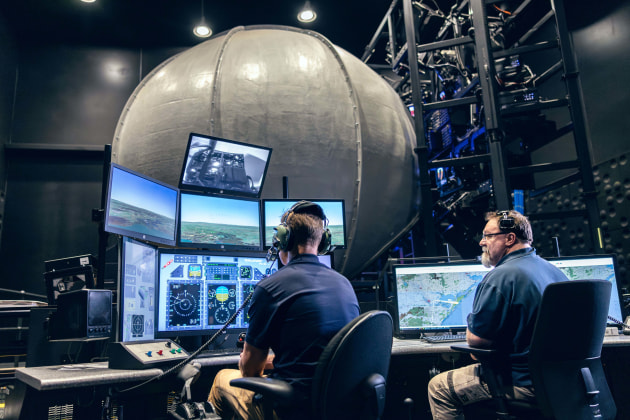 Lockheed Martin Australia engineers operate flight training device, East Sale, Victoria.

Credit: Lockheed Martin Australia