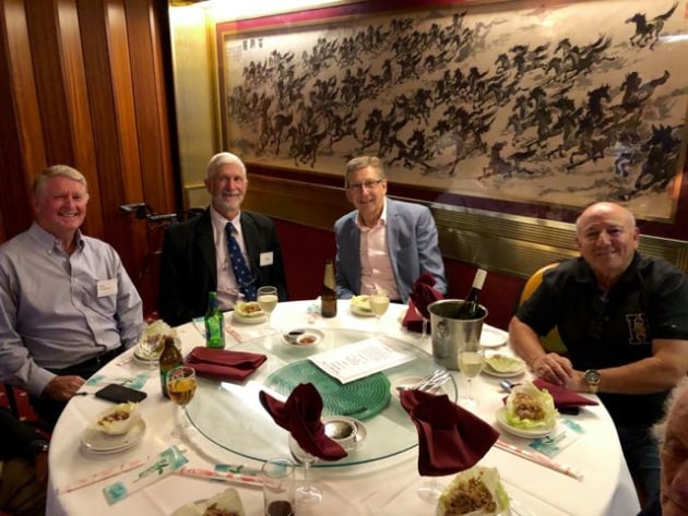 Gathering around the table are : Paul Richardson, Philip Anderson, Scott Telfer and Emmanuel Buhagier.