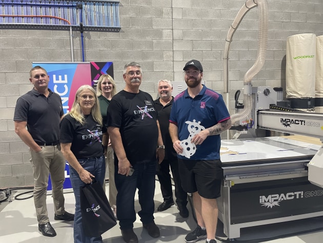 The Impact CNC team.