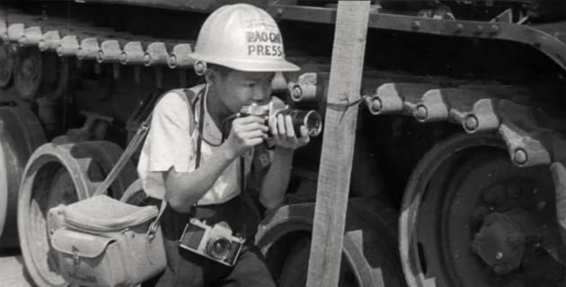 Armed with two Asahi Pentax cameras, he was fearless on the battlefield.