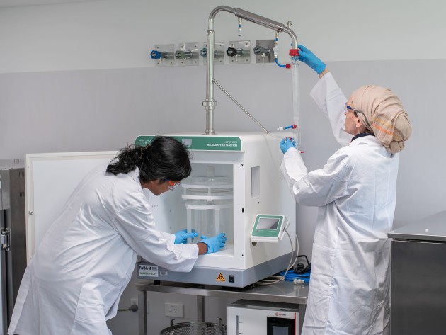 Geethi Eshani Ilukpitiya (left) Charlotte Duniam (right) preparing Microwave Extractor to extract flavour compounds from a range of natural sources such as leaves, fruits and berries.