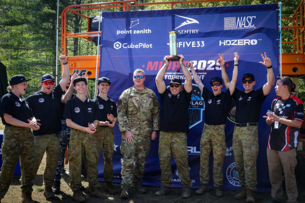 The Australian Defence Force Drone Racing Team celebrate, after retaining the title as Champion Military International Drone Racing Team, at the Military International Drone Racing Tournament in Lewis, New York in May, 2025.

Credit: Defence